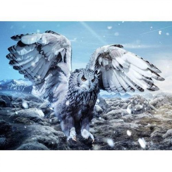 Ugle med spredde vinger